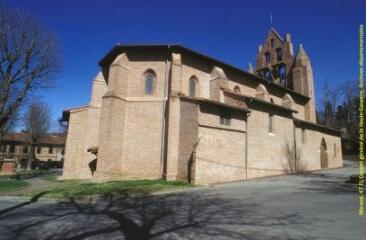 1 vue Plan d'ensemble de l'église et vue de l'arrière du clocher-mur, vue latérale, côté chevet. - Prise de vue du 18 juin 1998.