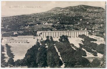 2 vues 94. Lodève : les casernes et le parc. - 26 mars 1918. - Carte postale