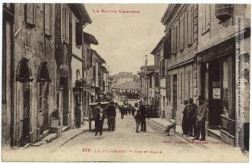 1 vue La Haute-Garonne. 229. Le Fousseret : rue et halle. - Toulouse : phototypie Labouche frères, marque LF, [1930]. - Carte postale